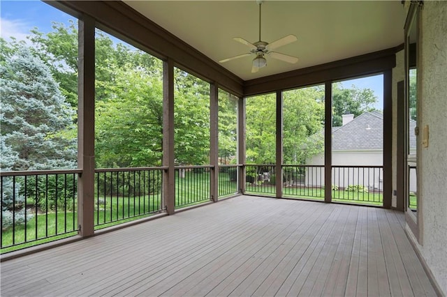 4704 W 152nd St, Leawood, KS 66224 - unfurnished sunroom with ceiling fan, hardwood / wood-style floors, and a wooden deck