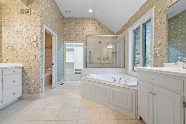 4704 W 152nd St, Leawood, KS 66224 - bathroom featuring vaulted ceiling, a bath, tile patterned floors, vanity, and a stall shower