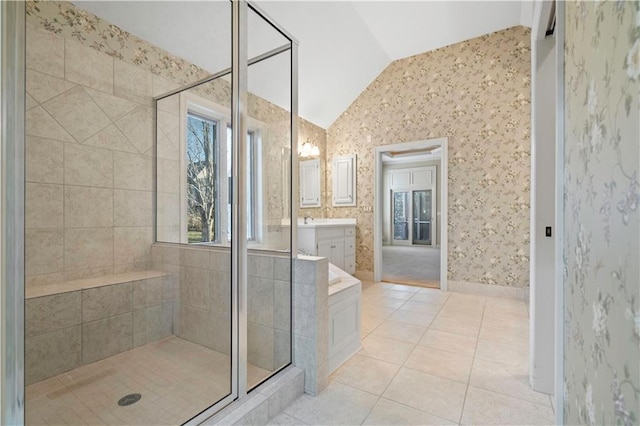 4704 W 152nd St, Leawood, KS 66224 - bathroom with lofted ceiling, a stall shower, tile patterned flooring, vanity, and wallpapered walls