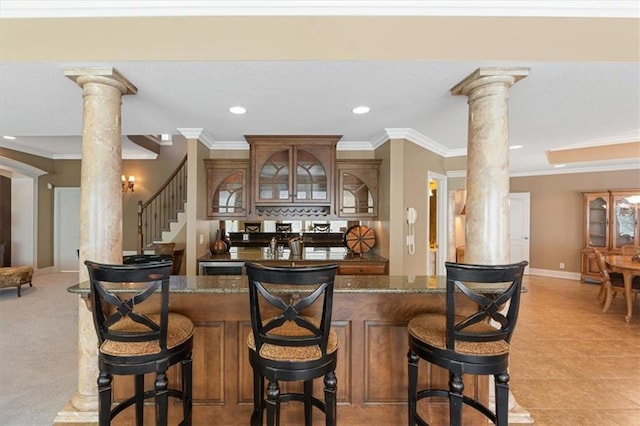 21211 E 34th St S, Independence, MO 64057 - indoor bar with decorative columns, recessed lighting, stairs, baseboards, and ornamental molding
