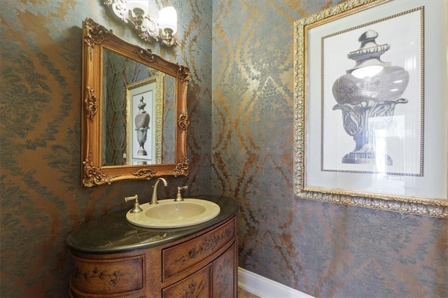 21211 E 34th St S, Independence, MO 64057 - bathroom with vanity and wallpapered walls