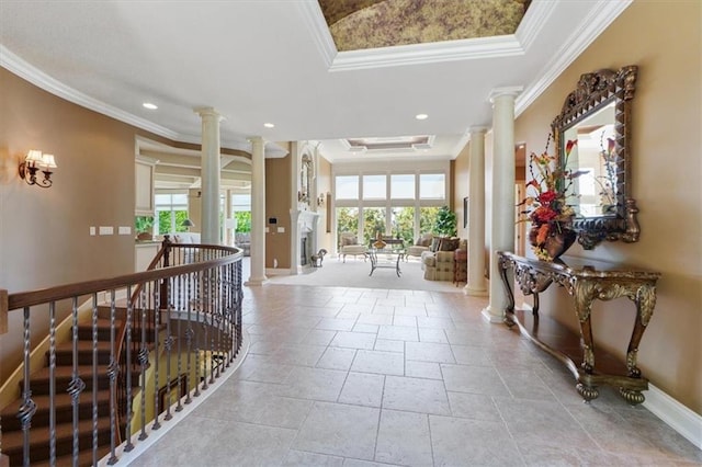 21211 E 34th St S, Independence, MO 64057 - entryway with ornate columns, crown molding, baseboards, a tray ceiling, and recessed lighting