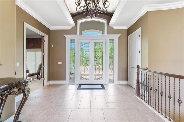 21211 E 34th St S, Independence, MO 64057 - entryway featuring a chandelier, baseboards, lofted ceiling, crown molding, and french doors