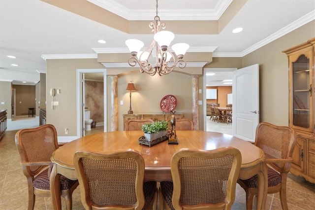 21211 E 34th St S, Independence, MO 64057 - dining area with a chandelier, ornamental molding, decorative columns, recessed lighting, and a tray ceiling