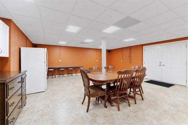 21211 E 34th St S, Independence, MO 64057 - dining room featuring a paneled ceiling and light floors