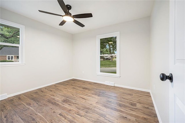 1917 N Concord Rd, Independence, MO 64058 - spare room with wood finished floors and ceiling fan
