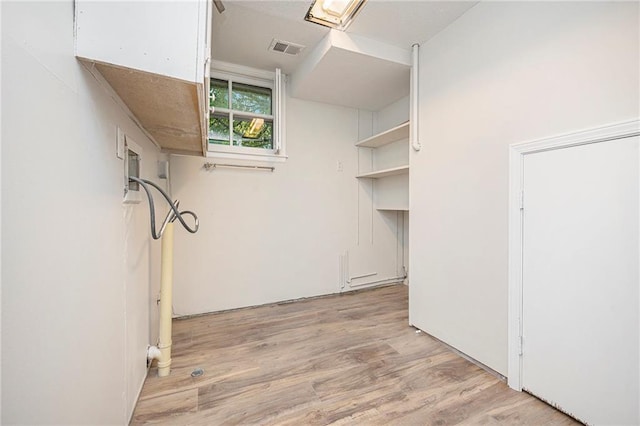 1917 N Concord Rd, Independence, MO 64058 - laundry room with light wood-style floors