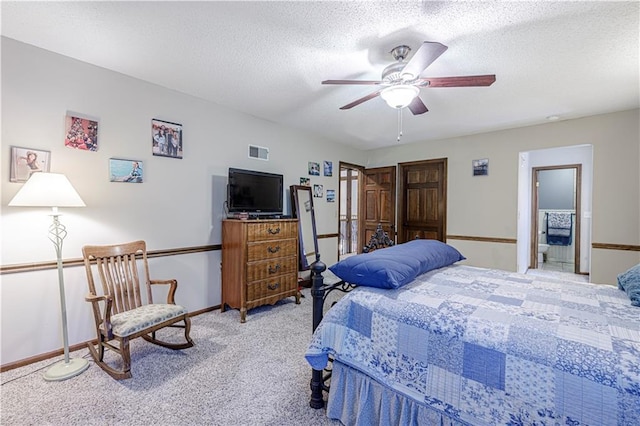 carpeted bedroom with baseboards, a textured ceiling, and ceiling fan