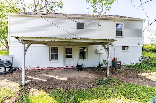 1007 Vest Dr, Warrensburg, MO 64093 - back of property featuring central AC