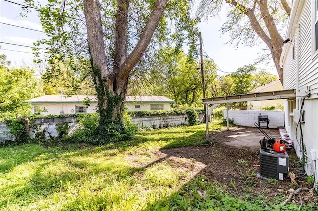 1007 Vest Dr, Warrensburg, MO 64093 - view of yard with a patio and central air condition unit