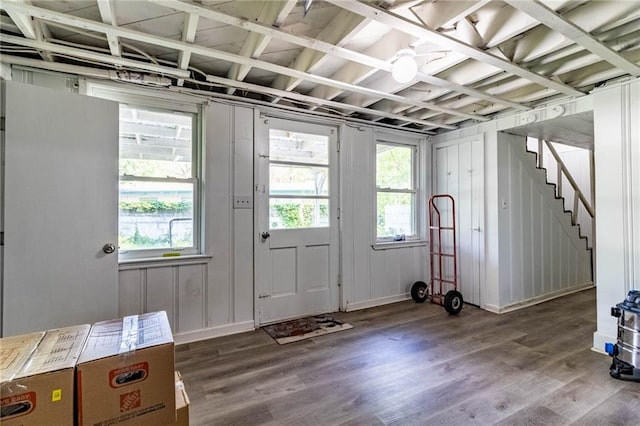 1007 Vest Dr, Warrensburg, MO 64093 - misc room featuring wood finished floors and stairway