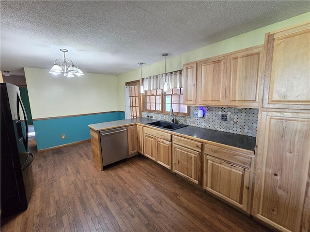 kitchen with black refrigerator with ice dispenser, a sink, stainless steel dishwasher, dark wood-style floors, and dark countertops