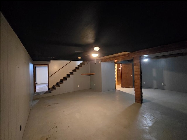 finished basement featuring stairway