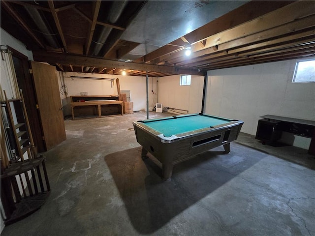 game room with concrete floors and billiards table