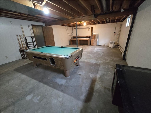 recreation room featuring unfinished concrete flooring and pool table