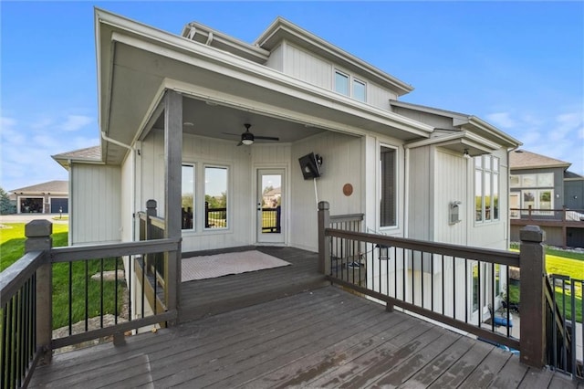 wooden deck featuring ceiling fan