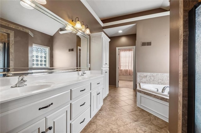 bathroom featuring healthy amount of natural light, a garden tub, double vanity, crown molding, and tile patterned flooring
