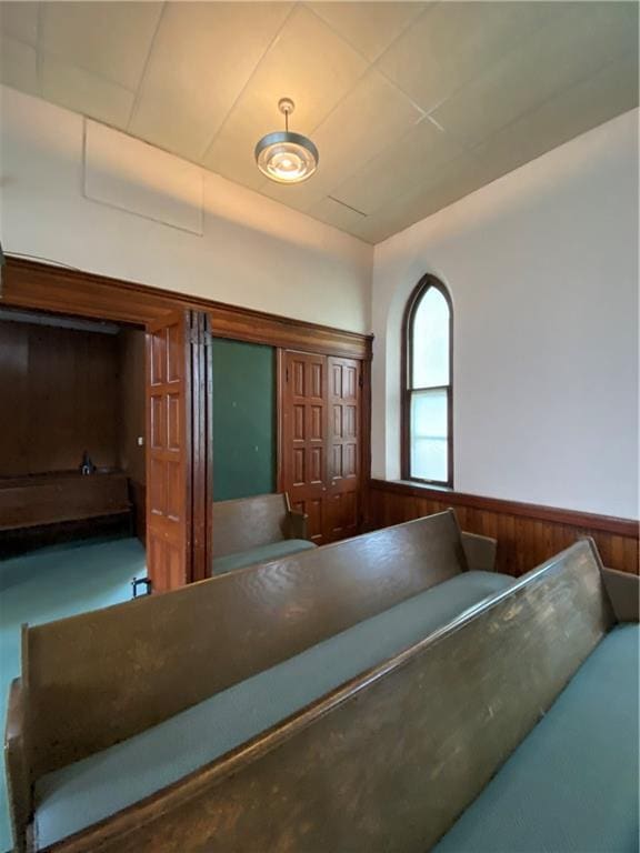 220 N 9th St, Atchison, KS 66002 - bathroom featuring wainscoting and wood walls