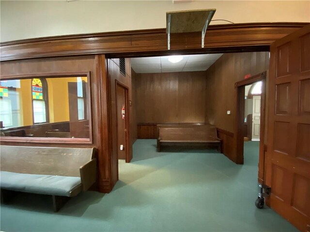 220 N 9th St, Atchison, KS 66002 - hallway featuring wooden walls