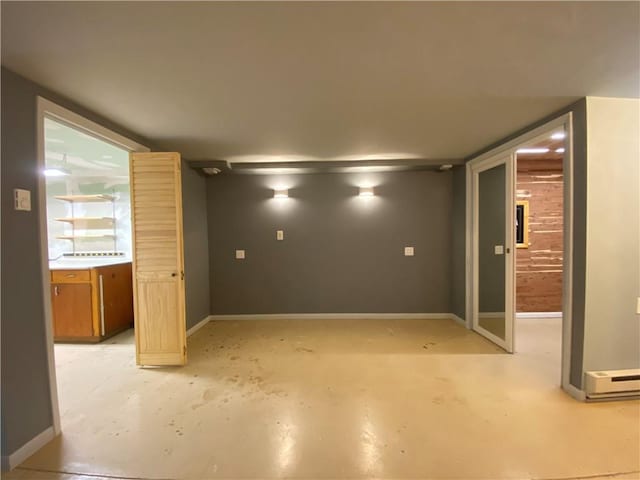 220 N 9th St, Atchison, KS 66002 - empty room featuring baseboards and unfinished concrete floors