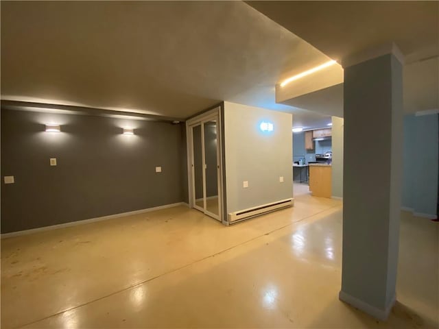 220 N 9th St, Atchison, KS 66002 - finished below grade area with a baseboard radiator and baseboards