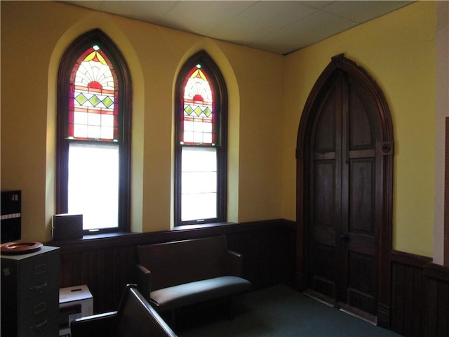220 N 9th St, Atchison, KS 66002 - miscellaneous room with a wainscoted wall and carpet floors