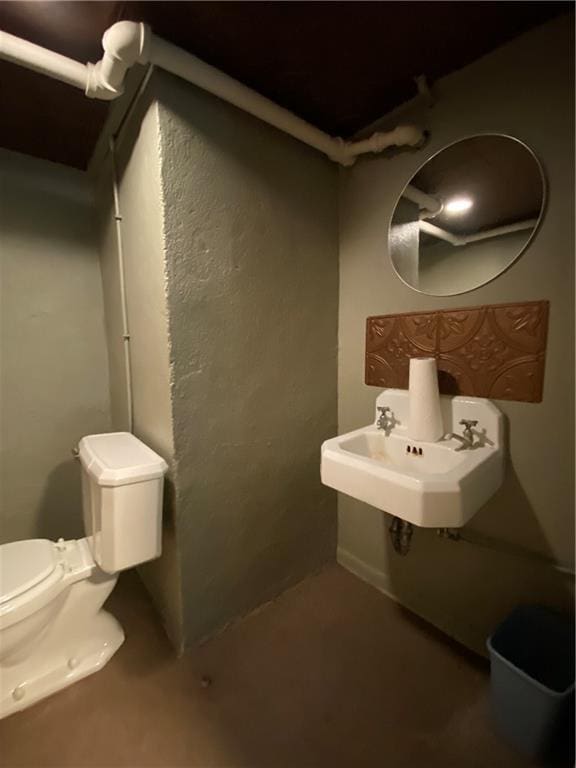 220 N 9th St, Atchison, KS 66002 - bathroom with a sink and toilet
