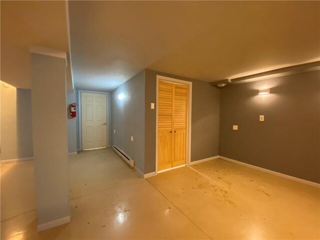 220 N 9th St, Atchison, KS 66002 - additional living space featuring a baseboard radiator and baseboards
