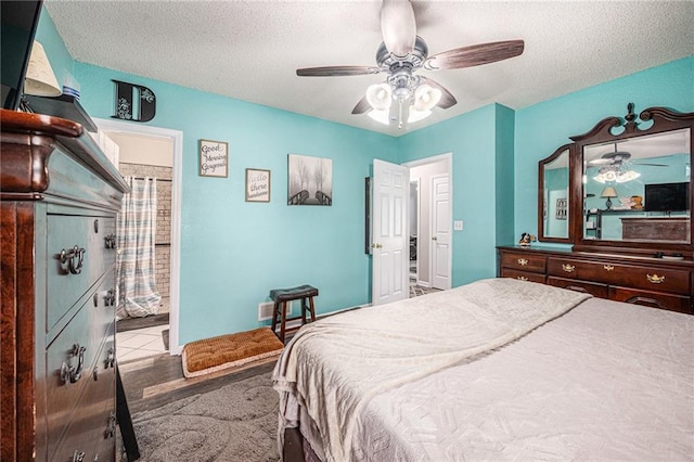 19204 E 15th Terrace Ct N, Independence, MO 64056 - bedroom with a textured ceiling and ceiling fan