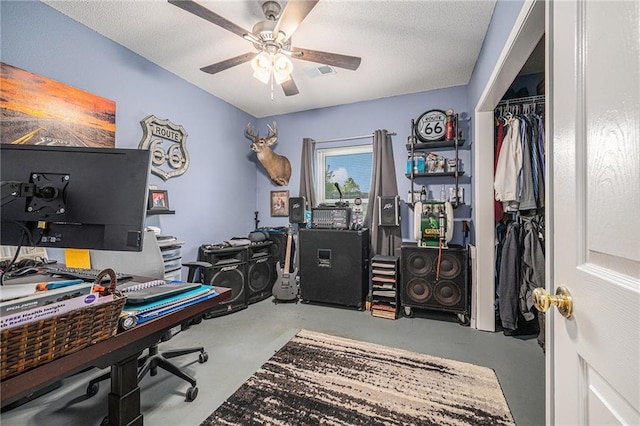 19204 E 15th Terrace Ct N, Independence, MO 64056 - office area with a ceiling fan, concrete floors, and a textured ceiling