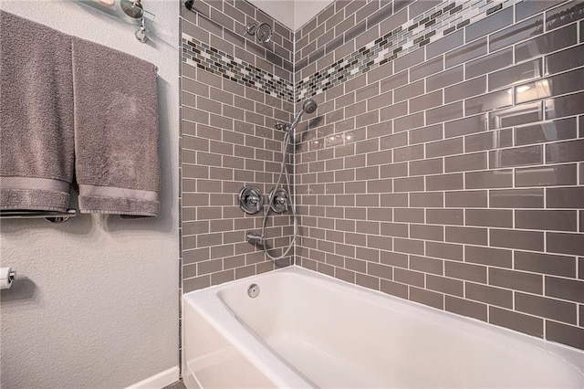 19204 E 15th Terrace Ct N, Independence, MO 64056 - bathroom with baseboards and bathtub / shower combination