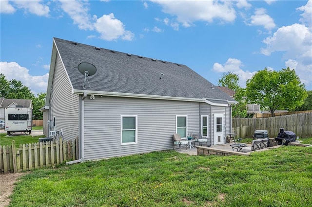 19204 E 15th Terrace Ct N, Independence, MO 64056 - rear view of property with a patio area and roof with shingles