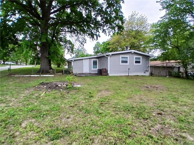 1029 Shearer Rd, Kansas City, KS 66103 - back of property with cooling unit