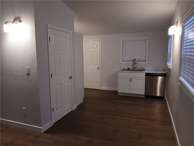 1029 Shearer Rd, Kansas City, KS 66103 - bar area with dishwasher, baseboards, dark wood-style flooring, and a sink