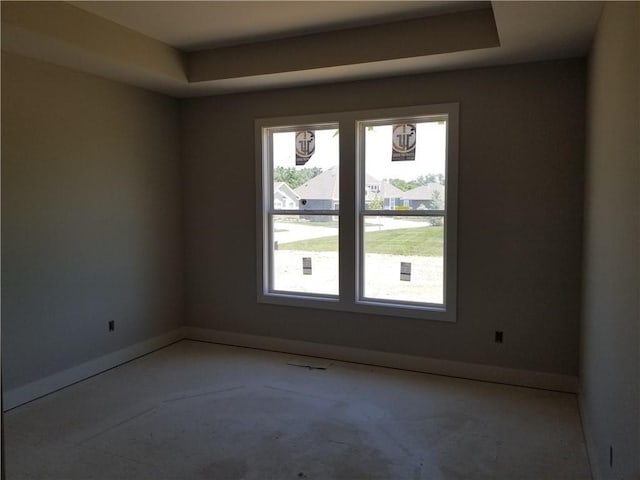 4615 N 144th Ter, Basehor, KS 66007 - spare room with baseboards and a raised ceiling