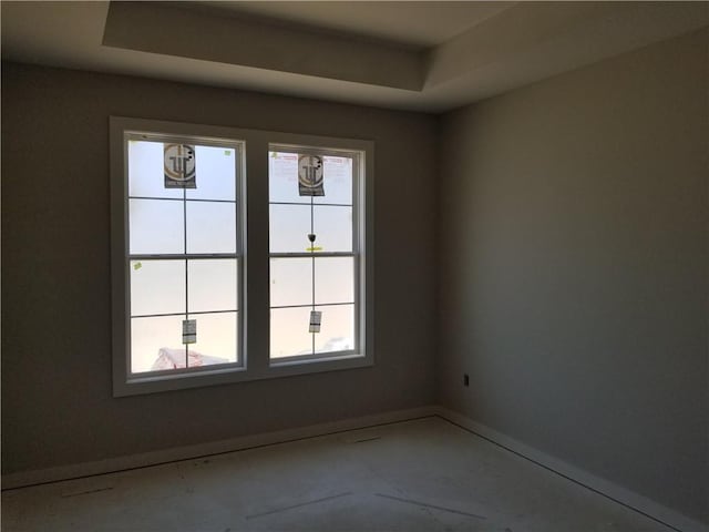 4615 N 144th Ter, Basehor, KS 66007 - unfurnished room featuring a tray ceiling
