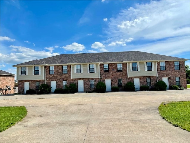 596 SE 105th Rd, Warrensburg, MO 64093 - multi unit property with brick siding and curved driveway