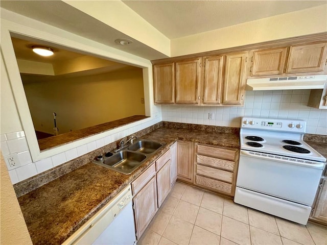 596 SE 105th Rd, Warrensburg, MO 64093 - kitchen with white appliances, under cabinet range hood, a sink, and dark countertops