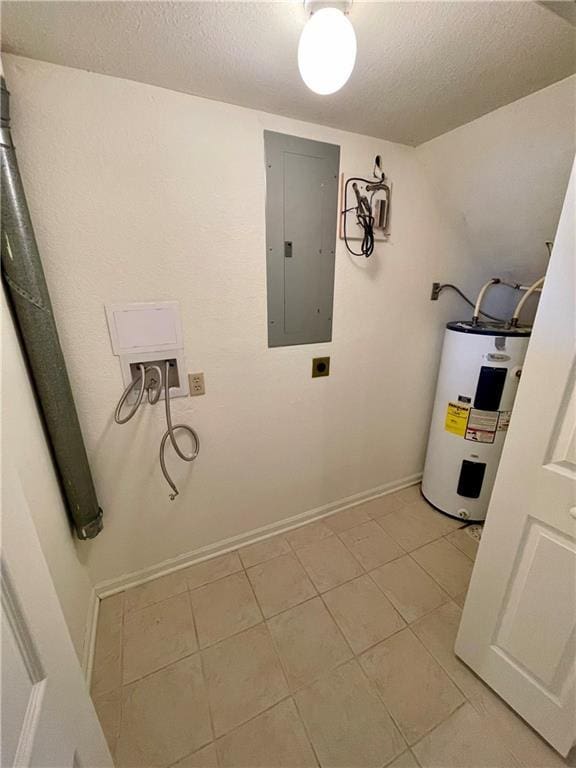 596 SE 105th Rd, Warrensburg, MO 64093 - laundry room featuring electric water heater, electric panel, hookup for an electric dryer, a textured ceiling, and baseboards