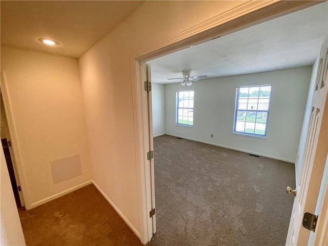 596 SE 105th Rd, Warrensburg, MO 64093 - hall with baseboards, dark colored carpet, and recessed lighting