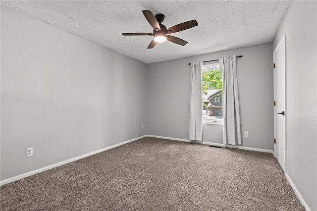 1036 NE Remington Ct, Lees Summit, MO 64086 - unfurnished room with a textured ceiling, a ceiling fan, carpet flooring, and baseboards