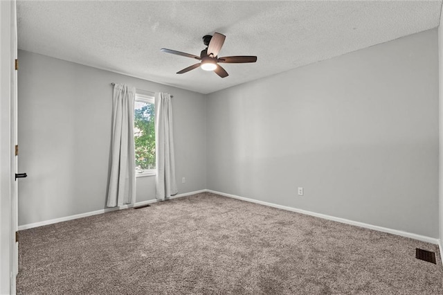 1036 NE Remington Ct, Lees Summit, MO 64086 - spare room with a ceiling fan, carpet flooring, a textured ceiling, and baseboards