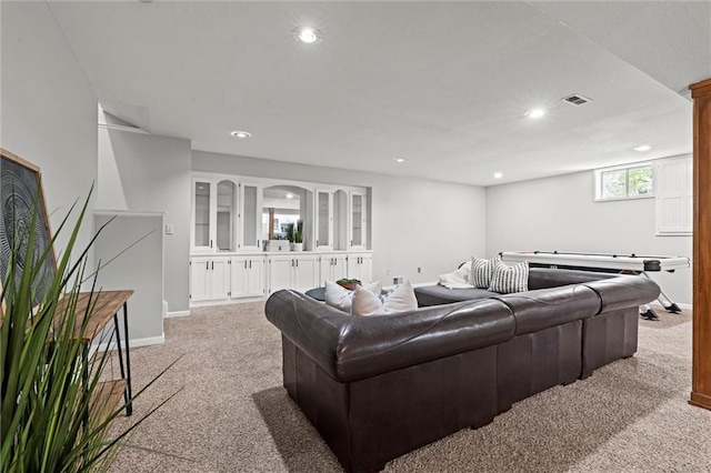 1036 NE Remington Ct, Lees Summit, MO 64086 - living area featuring light carpet, recessed lighting, and baseboards