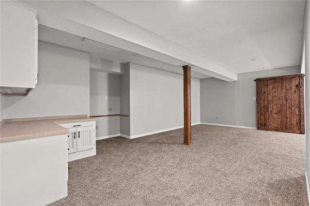 1036 NE Remington Ct, Lees Summit, MO 64086 - finished basement featuring carpet flooring and baseboards