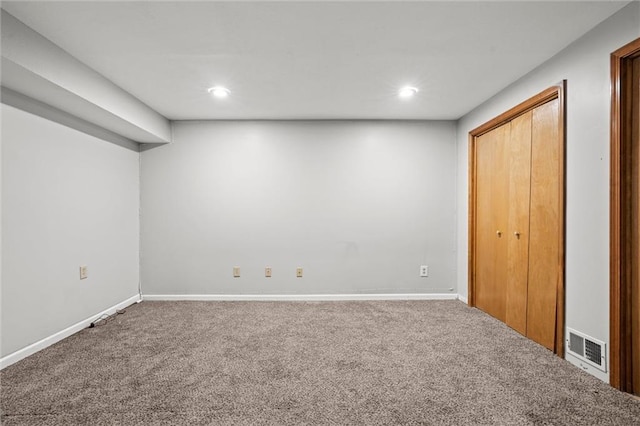 1036 NE Remington Ct, Lees Summit, MO 64086 - finished basement with carpet floors, baseboards, and recessed lighting