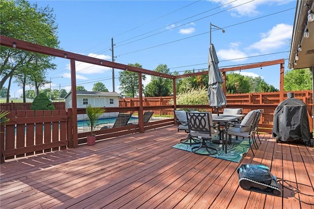 1036 NE Remington Ct, Lees Summit, MO 64086 - deck featuring a fenced backyard and outdoor dining area