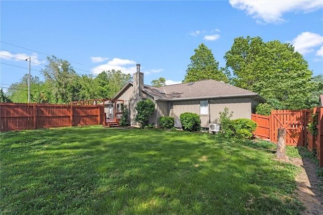 1036 NE Remington Ct, Lees Summit, MO 64086 - back of house with a chimney and a gate