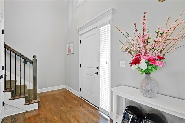25201 W 149th Ter, Olathe, KS 66061 - entryway featuring wood finished floors and stairway
