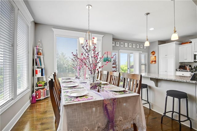 25201 W 149th Ter, Olathe, KS 66061 - dining room with dark wood-type flooring, a chandelier, and recessed lighting
