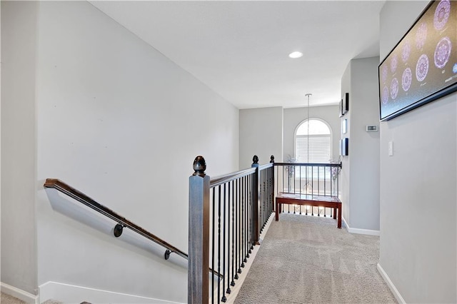 25201 W 149th Ter, Olathe, KS 66061 - hallway with an upstairs landing and light colored carpet